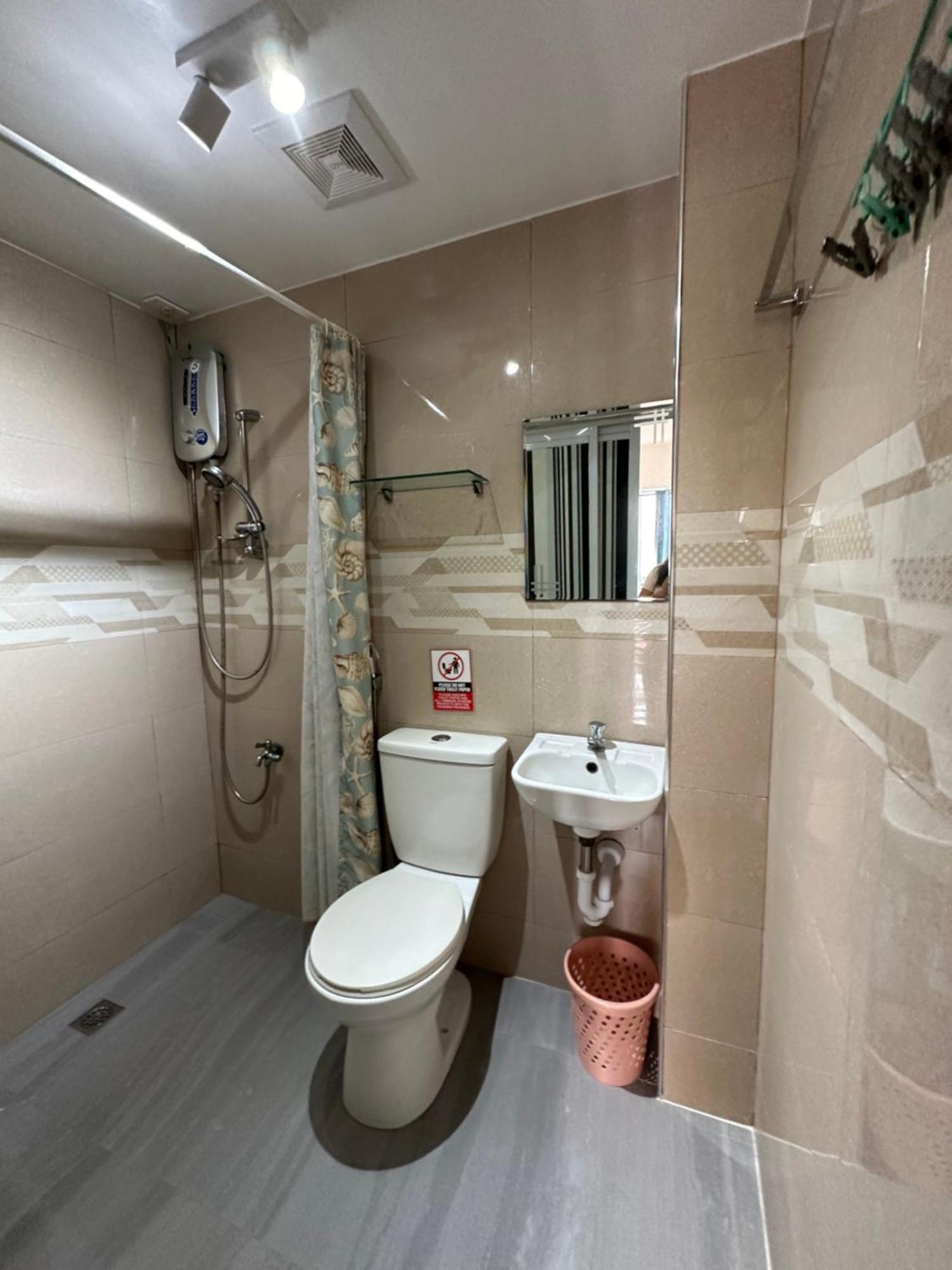 Apartamento Tacloban Evmc Gdex Transient House Exterior foto